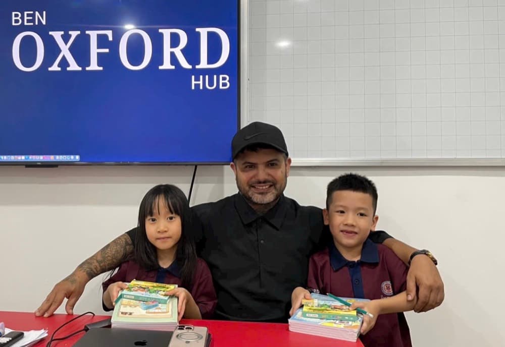 Teacher Ben with students at Ben Oxford Hub